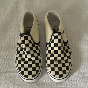 Vans Black and White Checkerboard Slip-On Sneakers